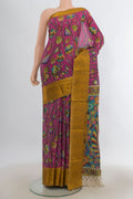 Pure Silk Pink kalamkari Saree with kalamkari Print on the body and Zari Border.  displayed on a mannequin