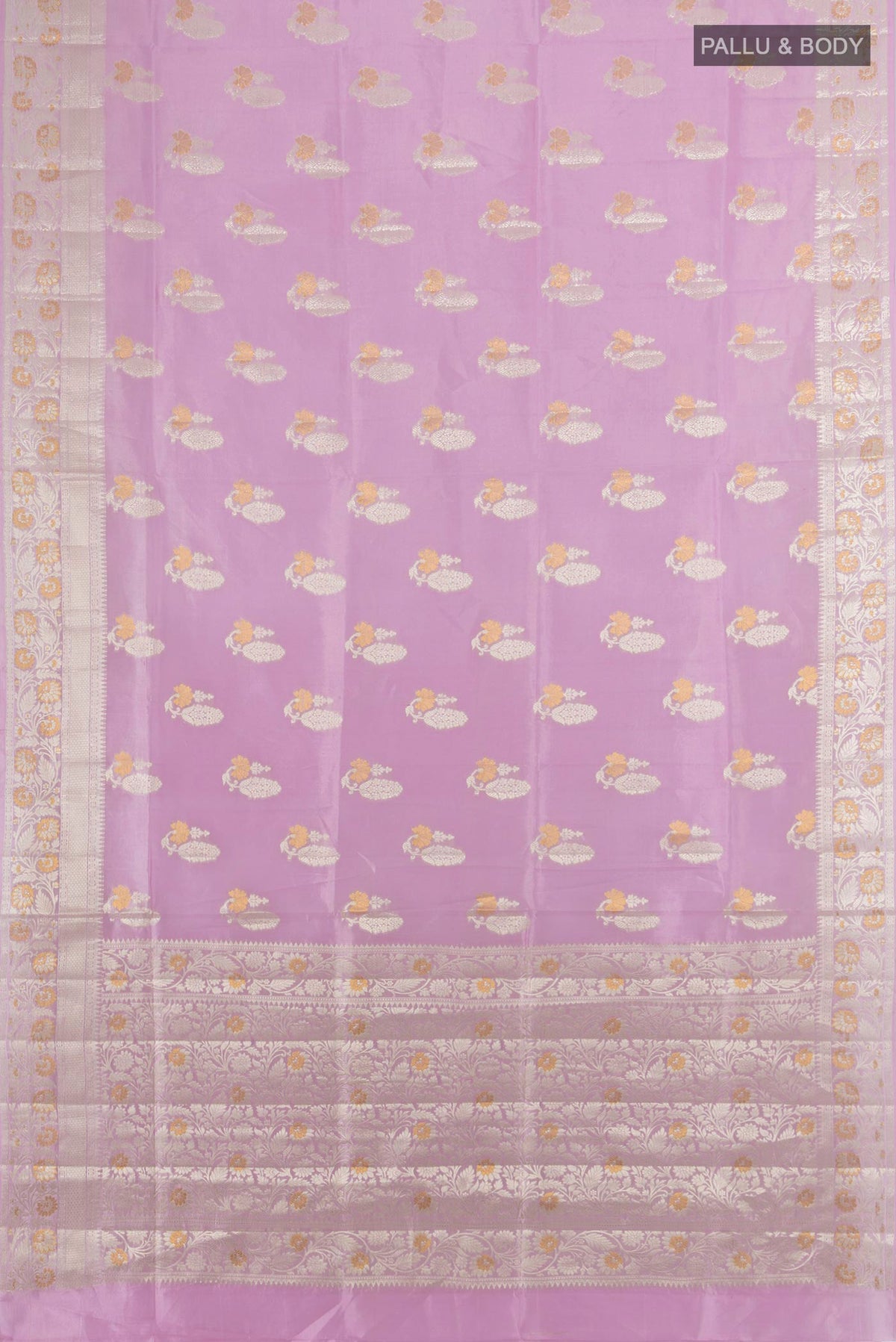 Flat view of Pure Silk Rose Gold Banarasi Raw Saree with Zari Butta on the body and Silk Border. 