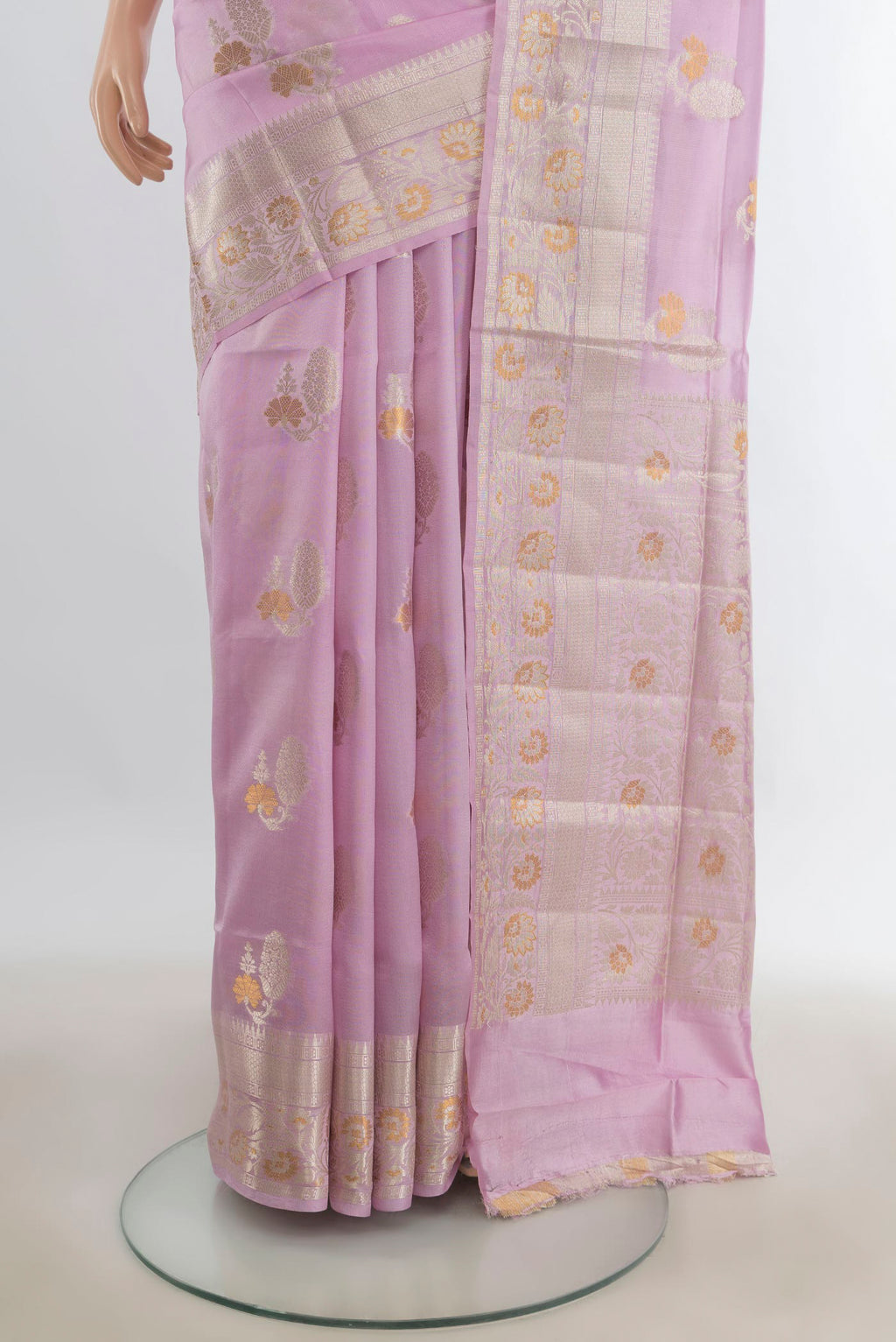 Pleats and pallu of Pure Silk Rose Gold Banarasi Raw Saree with Zari Butta on the body and Silk Border. 