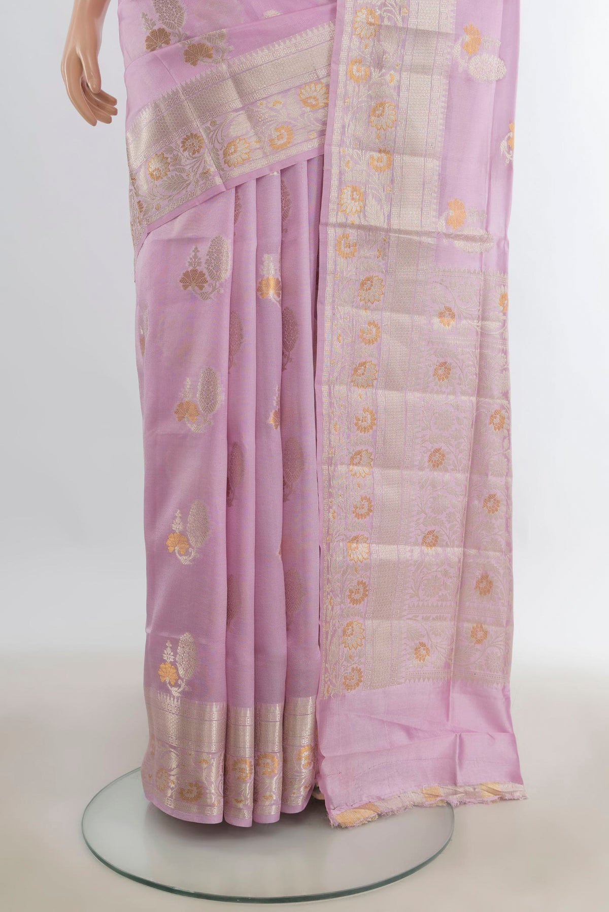Pleats and pallu of Pure Silk Rose Gold Banarasi Raw Saree with Zari Butta on the body and Silk Border. 