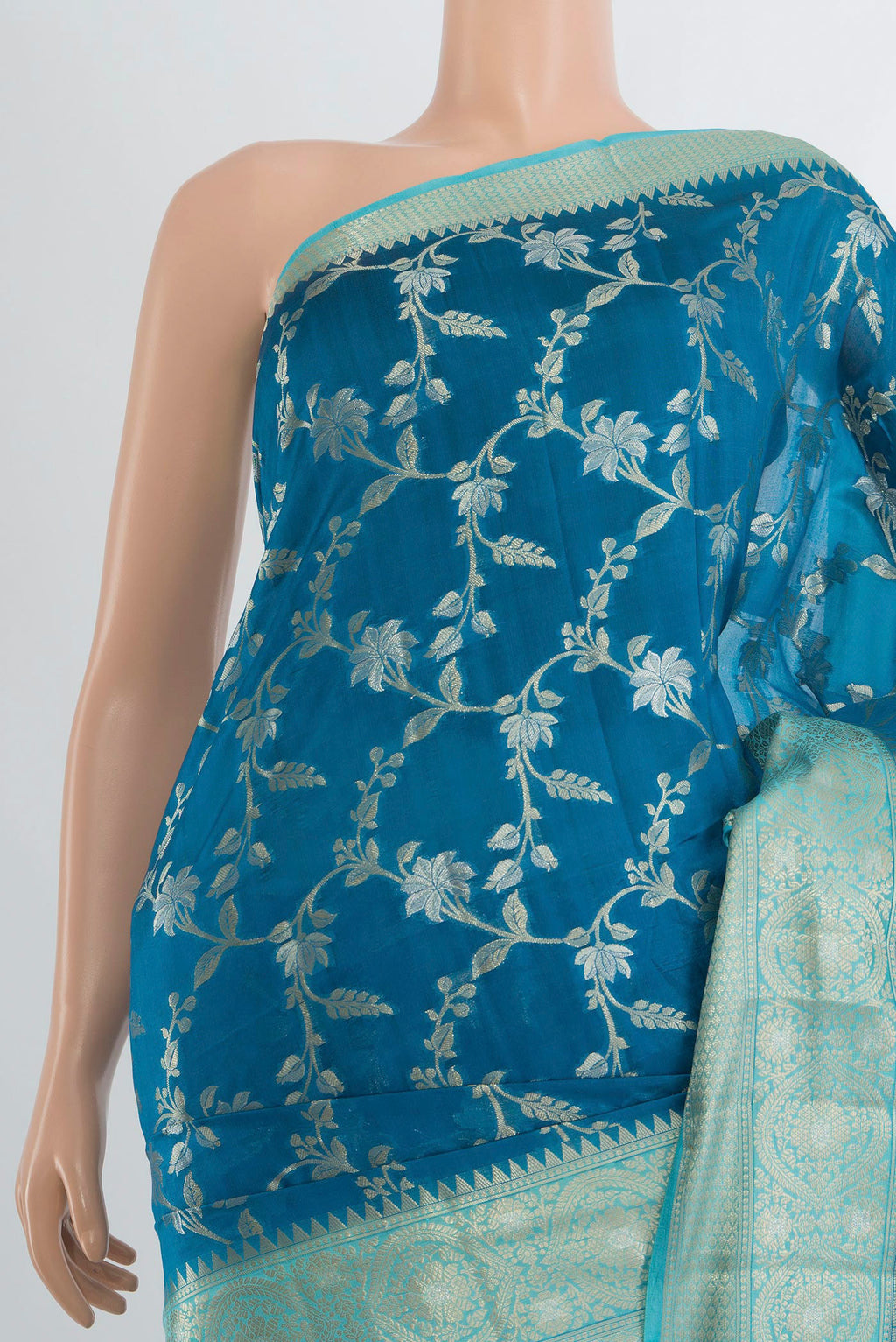 Border image of Pure Silk Peacock Blue Banarasi Raw Saree with Zari Butta on the body and Silk Border. 