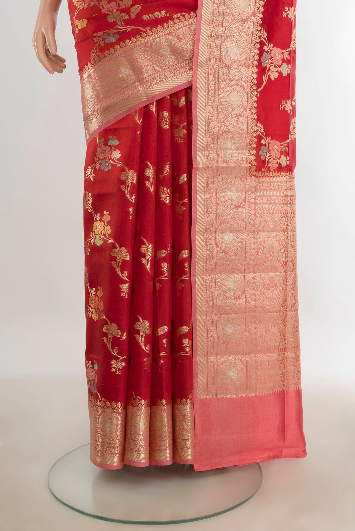 Pleats and pallu of Pure Silk Red Banarasi Raw Saree with Zari Butta on the body and Silk Border. 