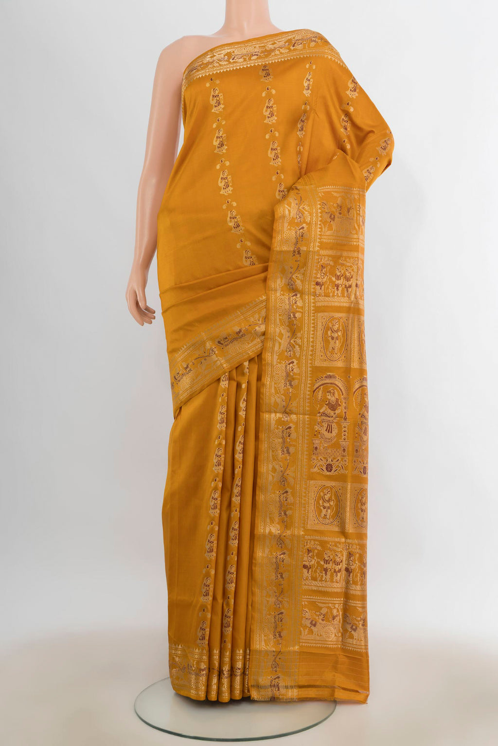 Pure Silk Mustard Baluchari Saree with Thread Butta on the body and Zari Border.  displayed on a mannequin