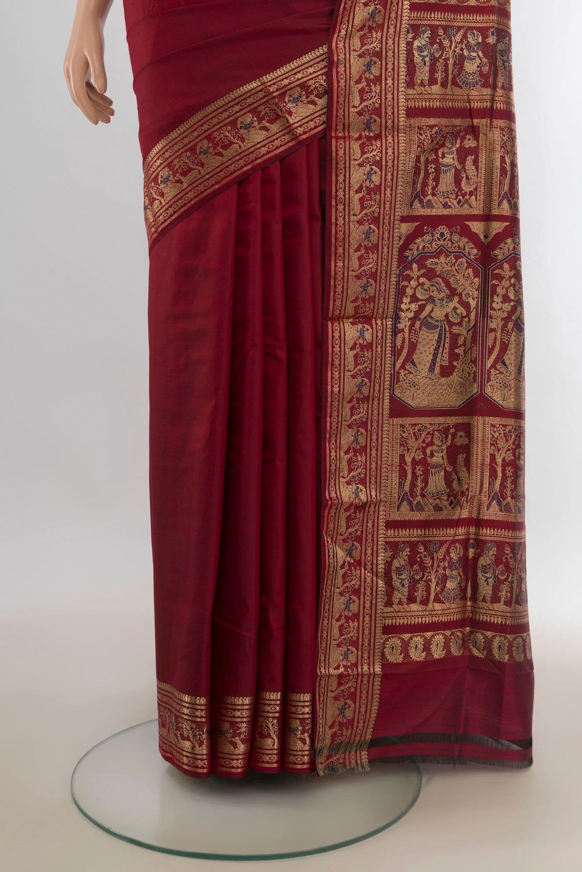 Pleats and pallu of Pure Silk Maroon Baluchari Saree with Zari Butta on the body and Zari Border. 