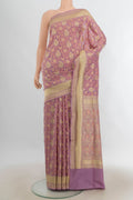 Pure Silk Bronze Banarasi Saree with Zari Butta on the body and Silk Border.  displayed on a mannequin