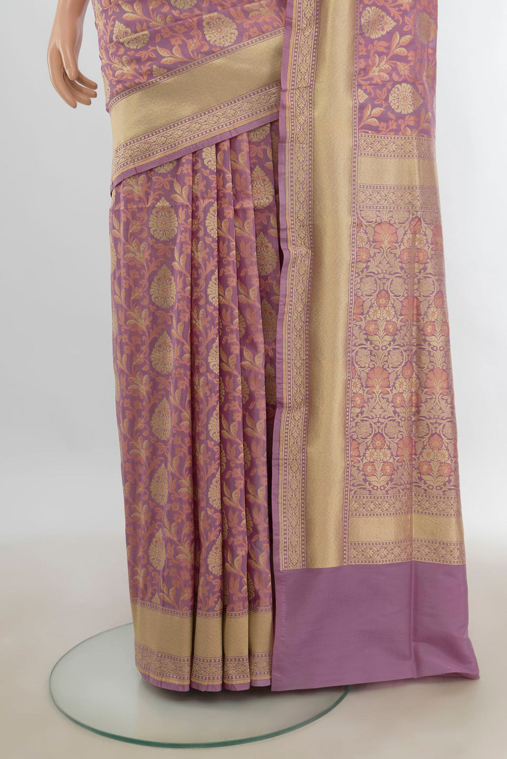 Pleats and pallu of Pure Silk Bronze Banarasi Saree with Zari Butta on the body and Silk Border. 