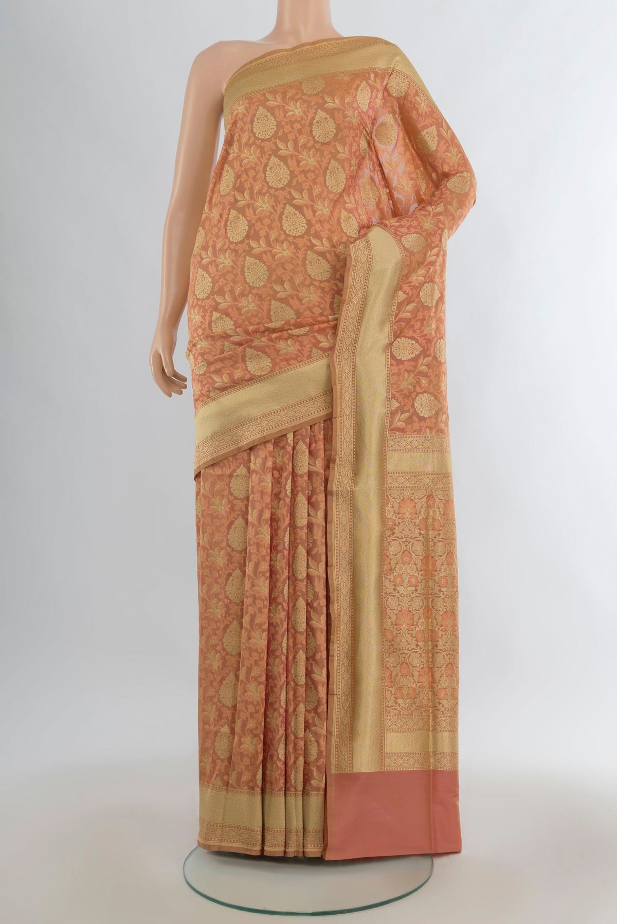 Pure Silk Peach Banarasi Saree with Jacquard With Zari Butta on the body and Zari Border.  displayed on a mannequin