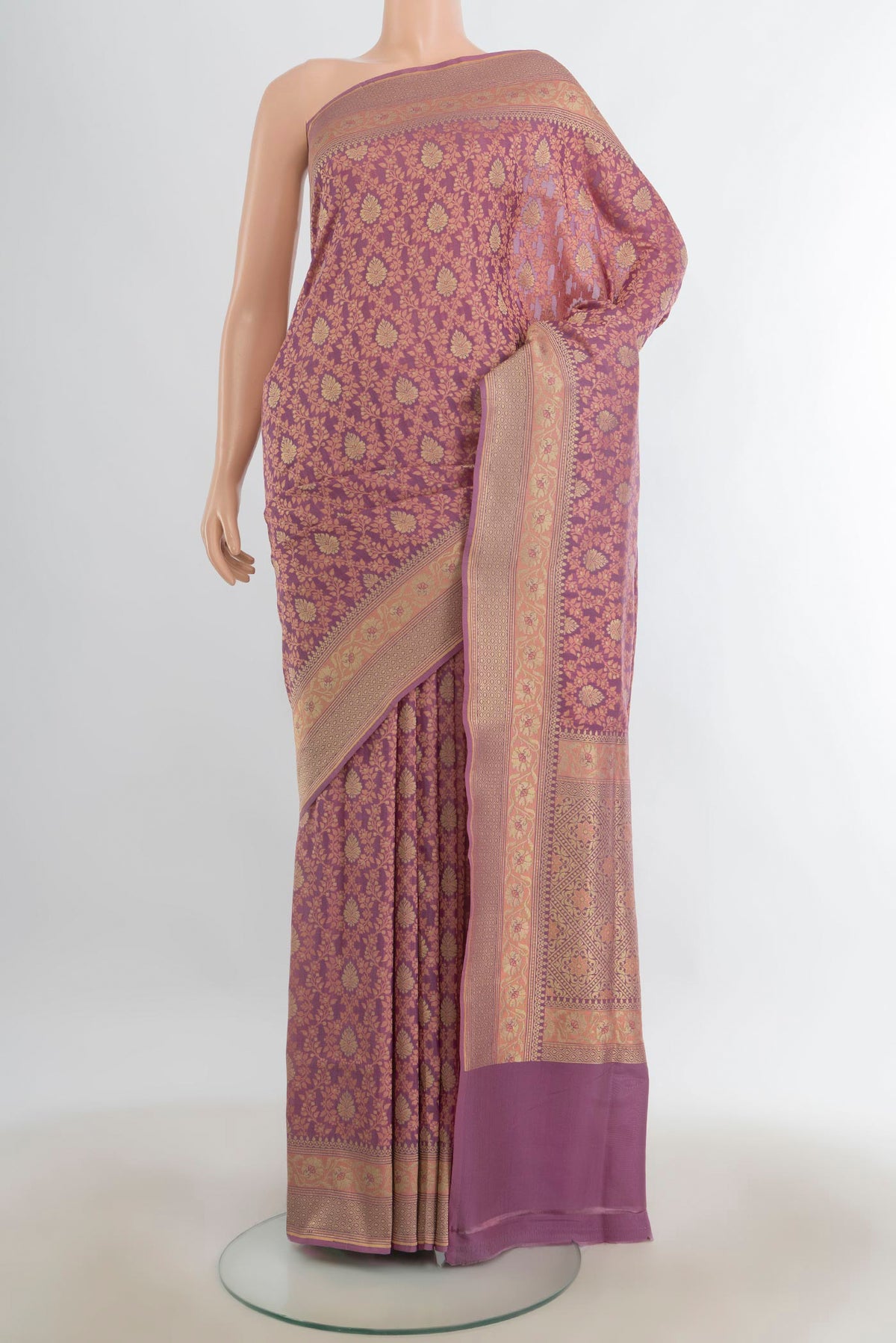 Pure Silk Multi Color Banarasi Saree with Thread Butta on the body and Silk Border.  displayed on a mannequin