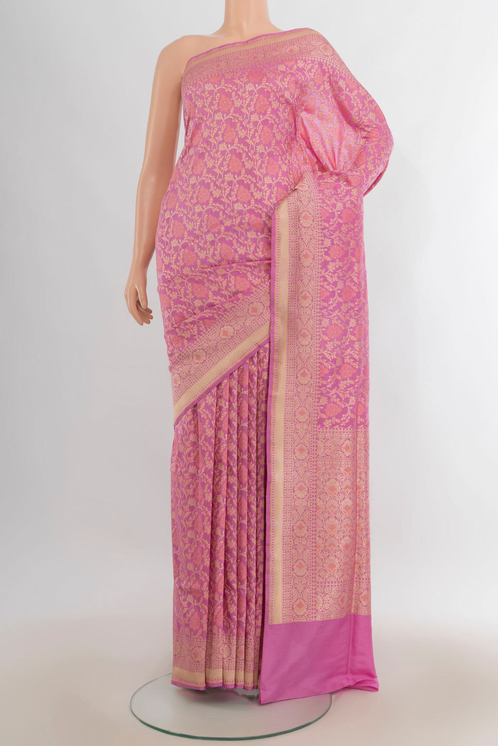 Pure Silk Rose pink Banarasi Saree with Jacquard With Zari Butta on the body and Zari Border.  displayed on a mannequin
