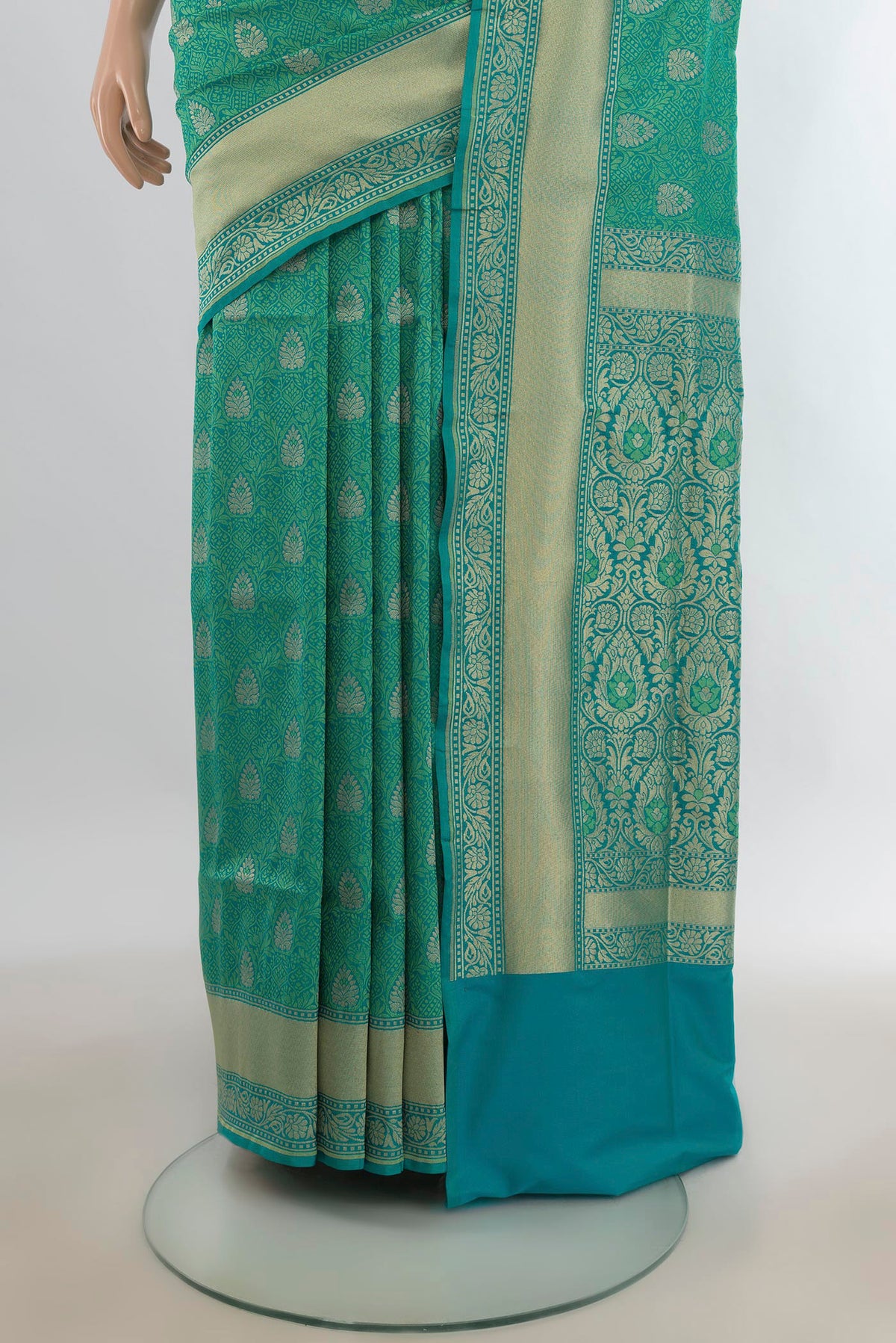 Pleats and pallu of Pure Silk Sea Green Banarasi Saree with Jacquard With Zari Butta on the body and Zari Border. 