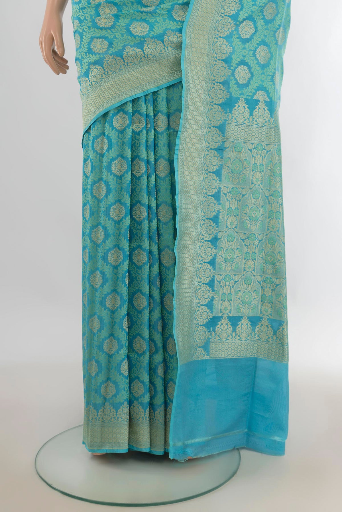 Pleats and pallu of Pure Silk Turquoise Banarasi Saree with Jacquard With Zari Butta on the body and Zari Border. 