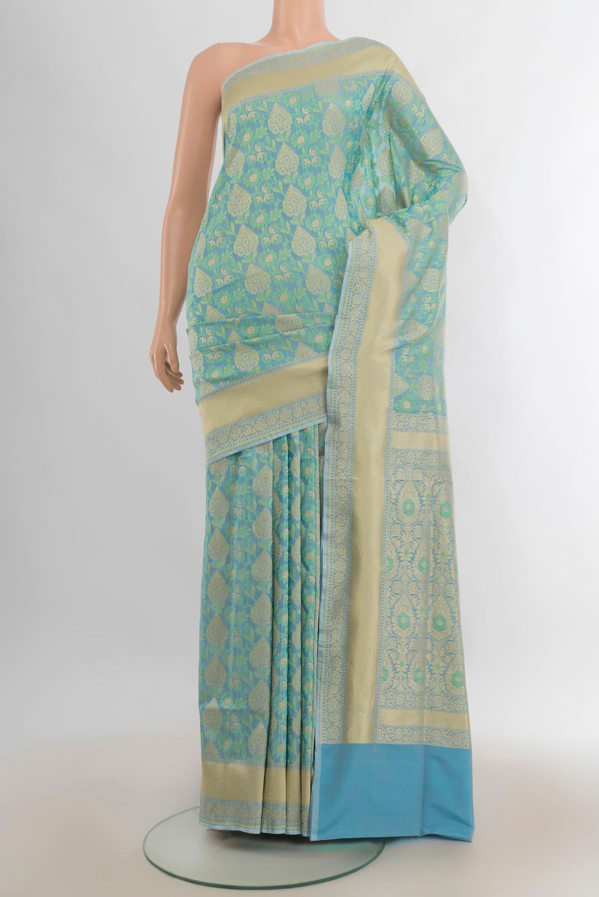 Pure Silk Light Blue Banarasi Saree with Jacquard With Zari Butta on the body and Zari Border.  displayed on a mannequin