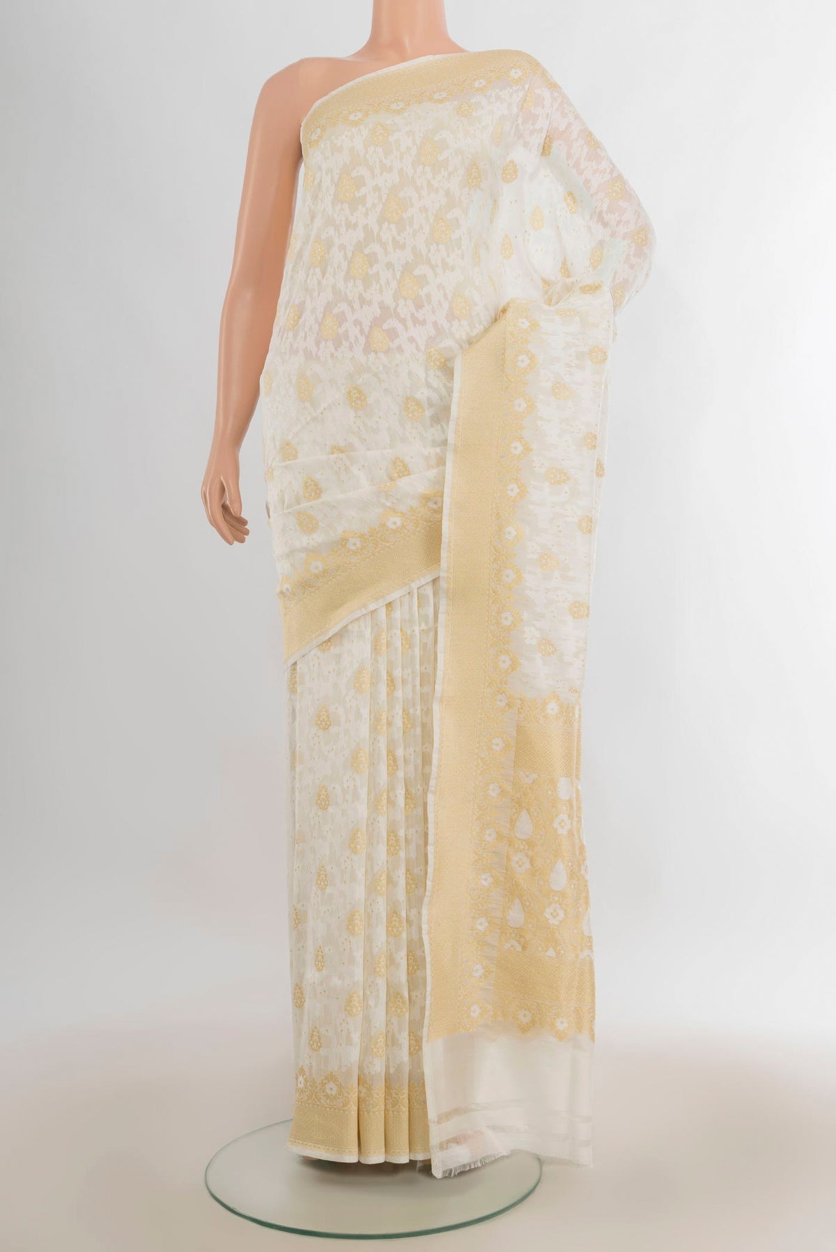 Pure Silk Cream Banarasi Saree with Jacquard With Zari Butta on the body and Zari Border.  displayed on a mannequin