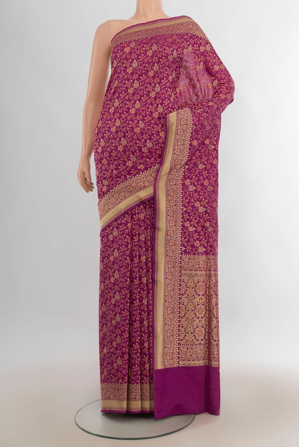 Pure Silk Magenta Banarasi Saree with Jacquard With Zari Butta on the body and Zari Border.  displayed on a mannequin