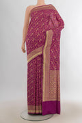 Pure Silk Magenta Banarasi Saree with Jacquard With Zari Butta on the body and Zari Border.  displayed on a mannequin