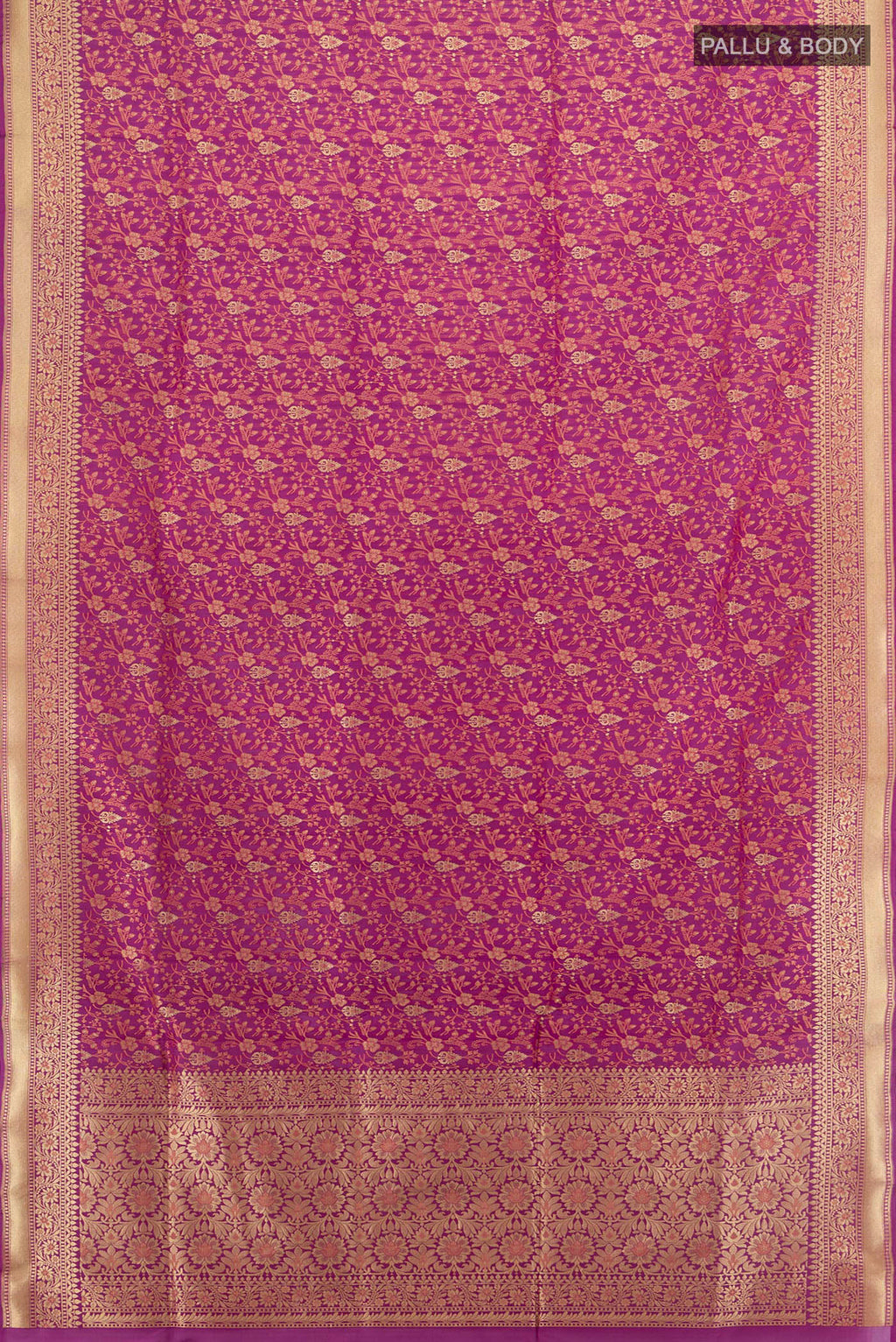 Flat view of Pure Silk Magenta Banarasi Saree with Jacquard With Zari Butta on the body and Zari Border. 