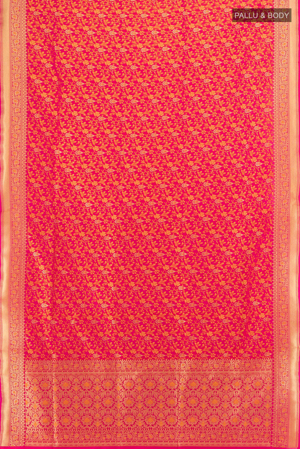 Flat view of Pure Silk Rani Pink Banarasi Saree with Jacquard design on the body and Zari Border. 