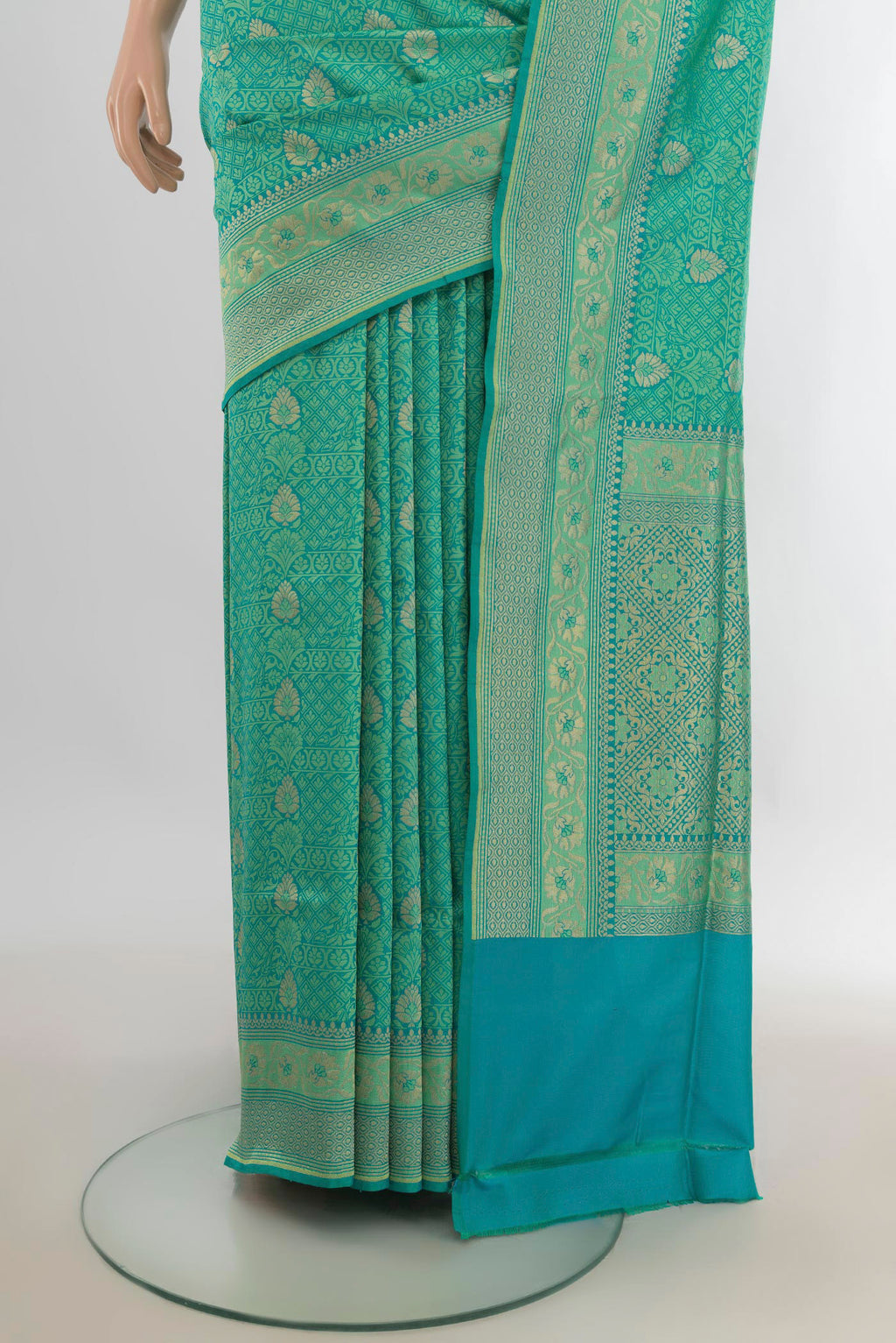 Pleats and pallu of Pure Silk Green Banarasi Saree with Jacquard With Zari Butta on the body and Zari Border. 