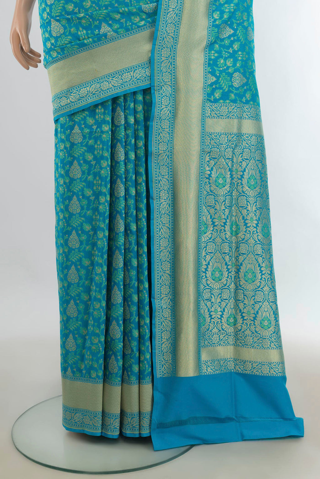 Pleats and pallu of Pure Silk Light Blue Banarasi Saree with Zari Butta on the body and Silk Border. 