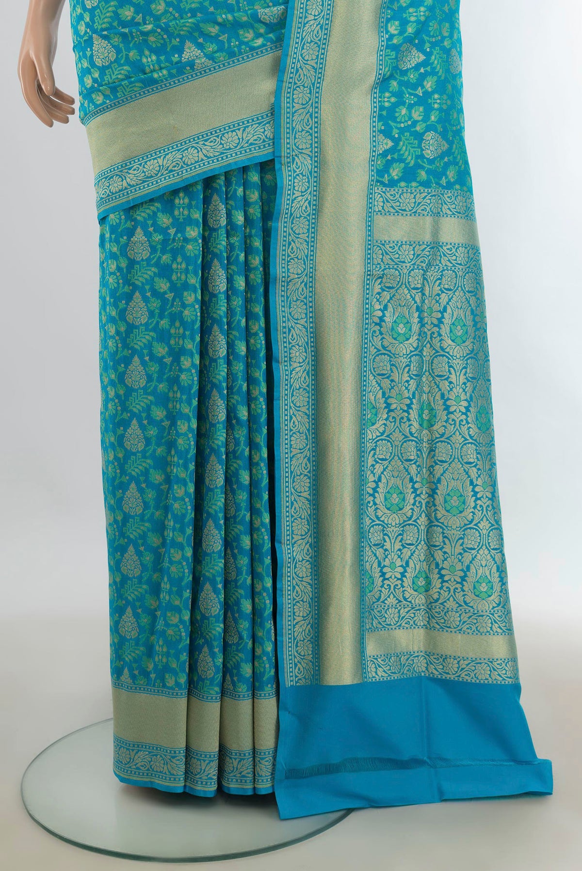 Pleats and pallu of Pure Silk Light Blue Banarasi Saree with Zari Butta on the body and Silk Border. 