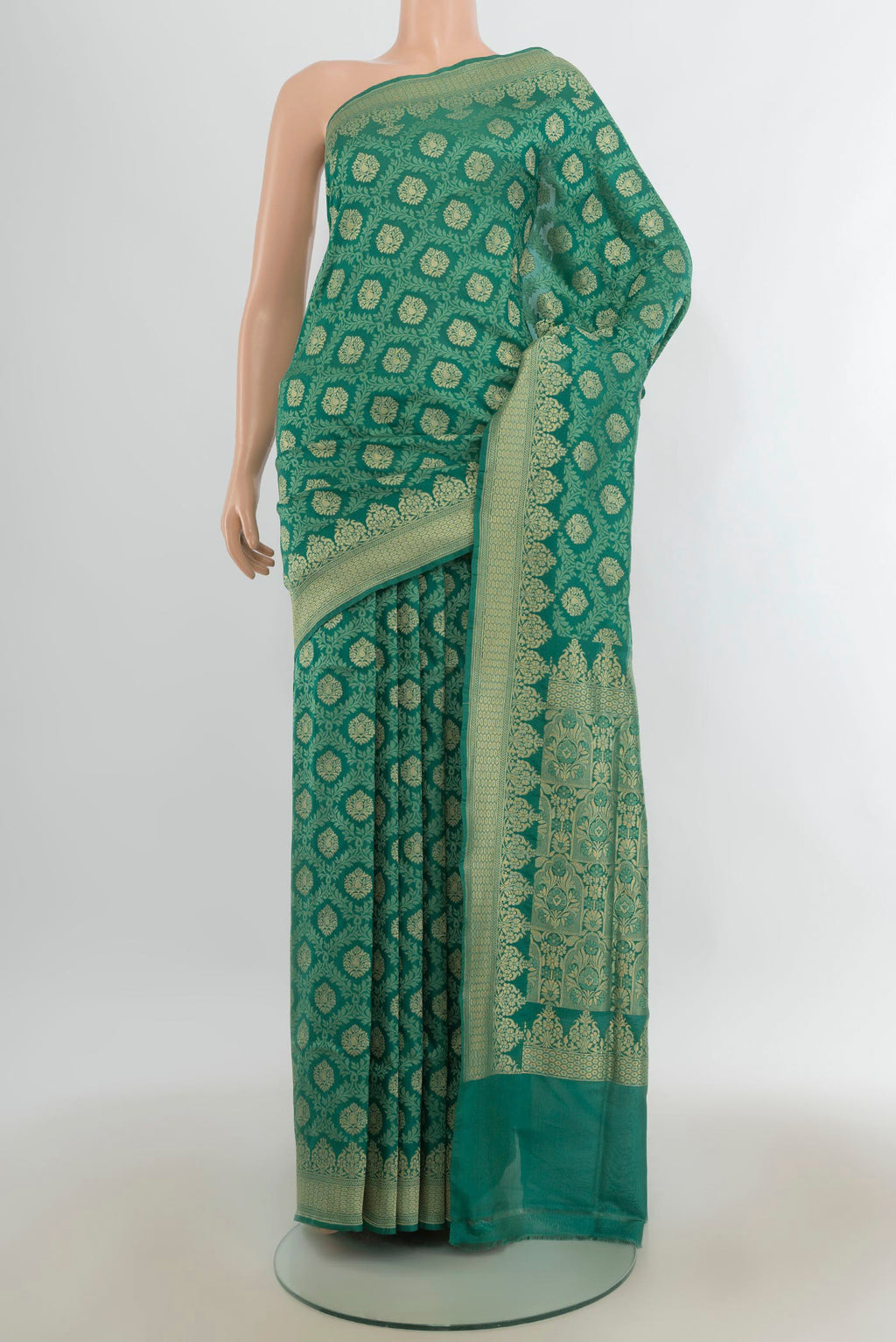 Pure Silk Green Banarasi Saree with Jacquard With Zari Butta on the body and Zari Border.  displayed on a mannequin