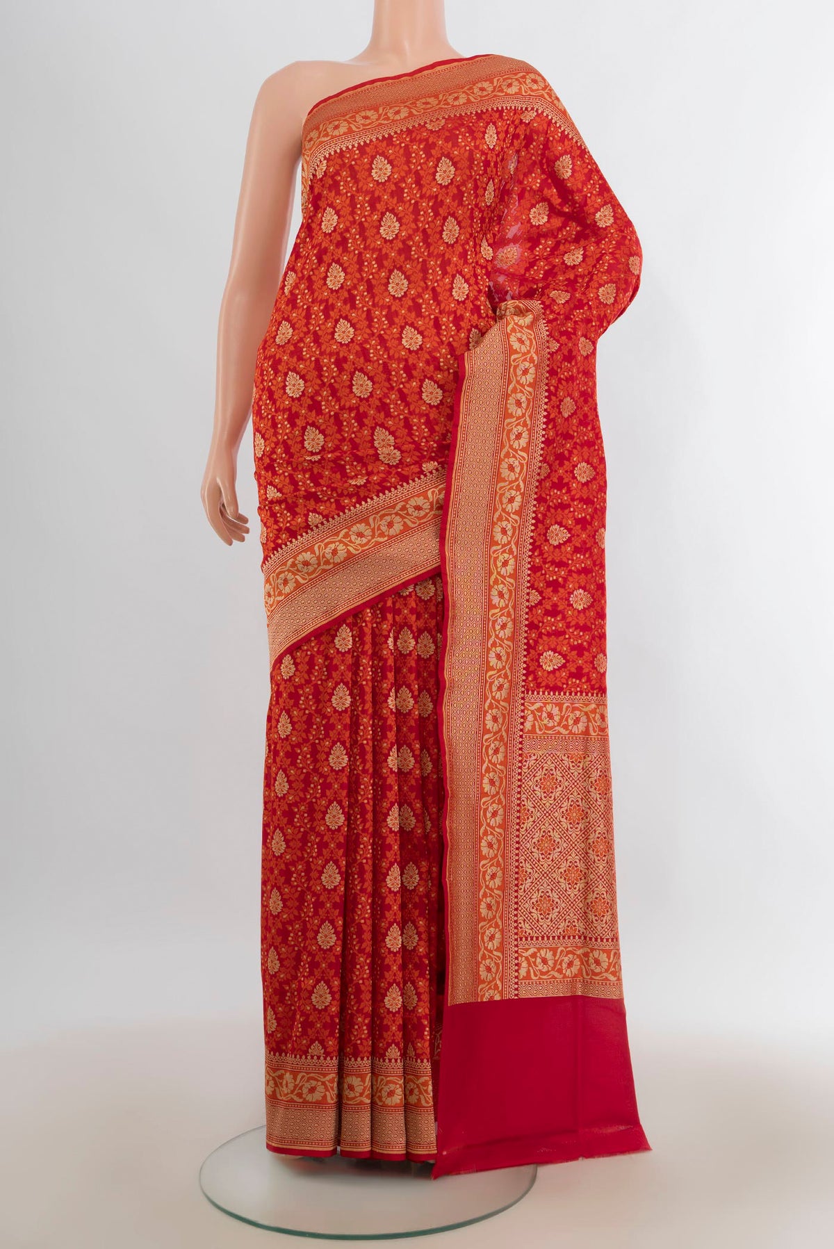 Pure Silk Red Banarasi Saree with Jacquard With Zari Butta on the body and Zari Border.  displayed on a mannequin