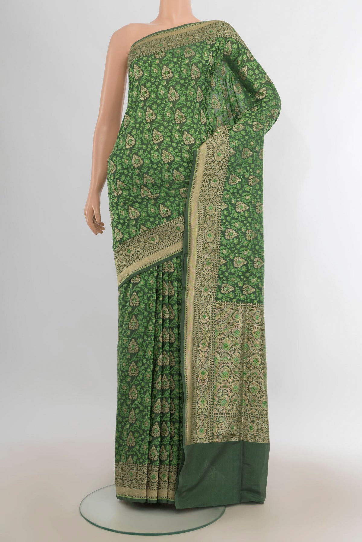 Pure Silk Green Banarasi Saree with Jacquard With Zari Butta on the body and Zari Border.  displayed on a mannequin