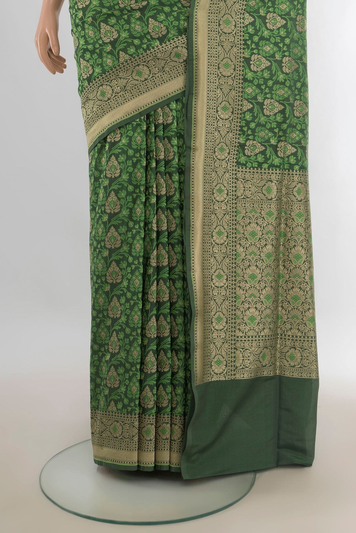 Pleats and pallu of Pure Silk Green Banarasi Saree with Jacquard With Zari Butta on the body and Zari Border. 