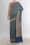 Pure Silk Multi Color Banarasi Saree with Jacquard With Zari Butta on the body and Zari Border.  displayed on a mannequin