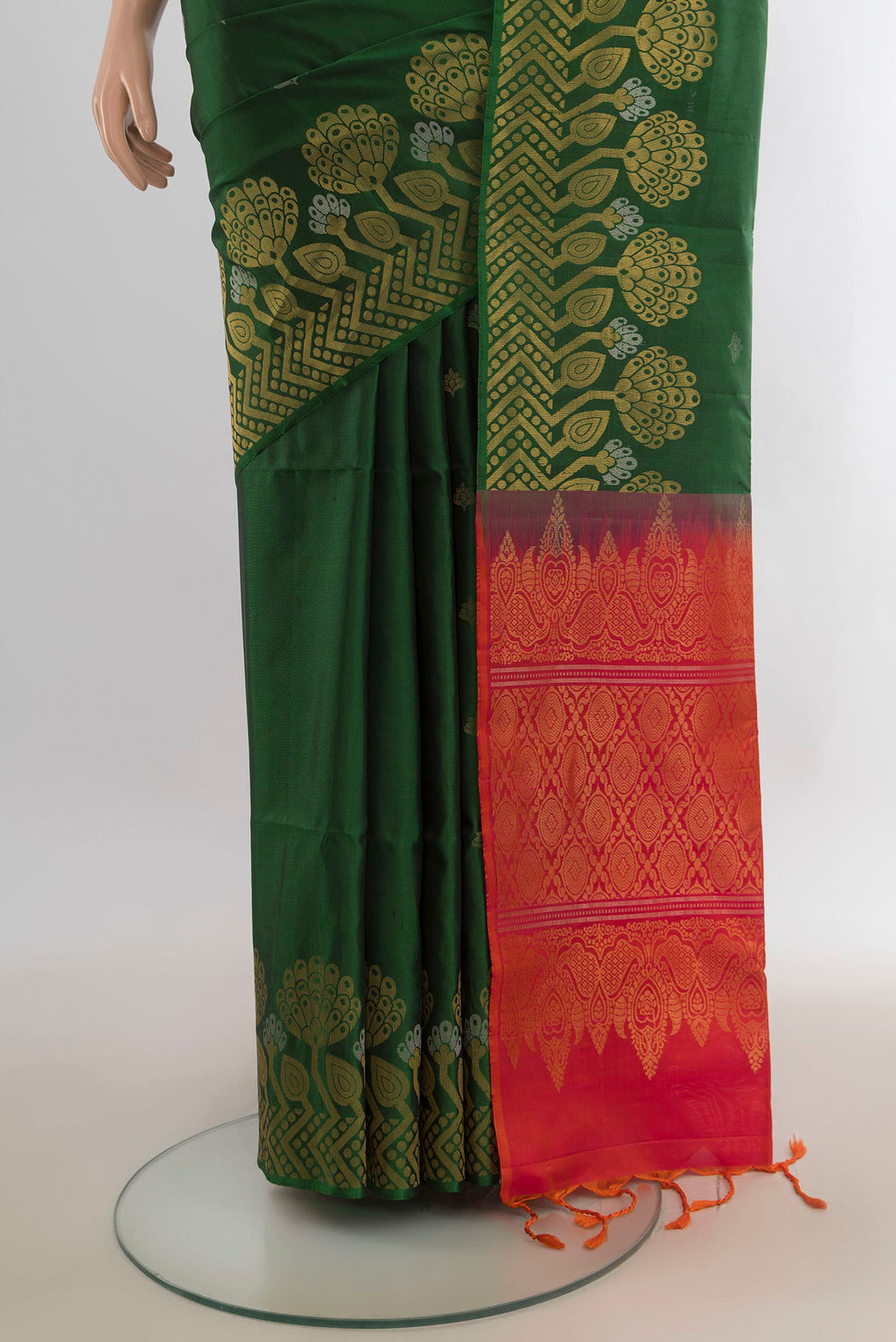 Pleats and pallu of Pure Silk Bottle Green Soft Saree with Zari Butta on the body and Zari Border. 