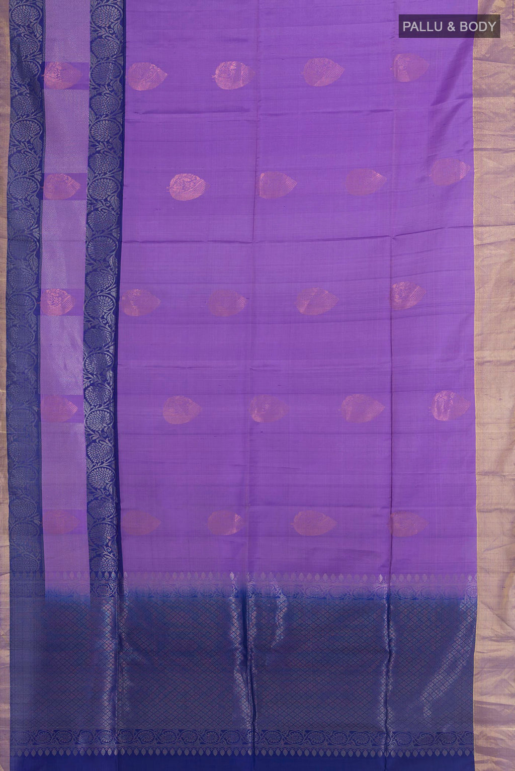Flat view of Pure Silk Lavender Soft Saree with Zari Butta on the body and Zari Border. 