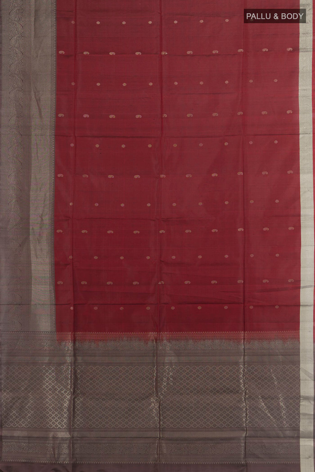 Flat view of Pure Silk Rust Soft Saree with Zari Butta on the body and Fancy Border. 