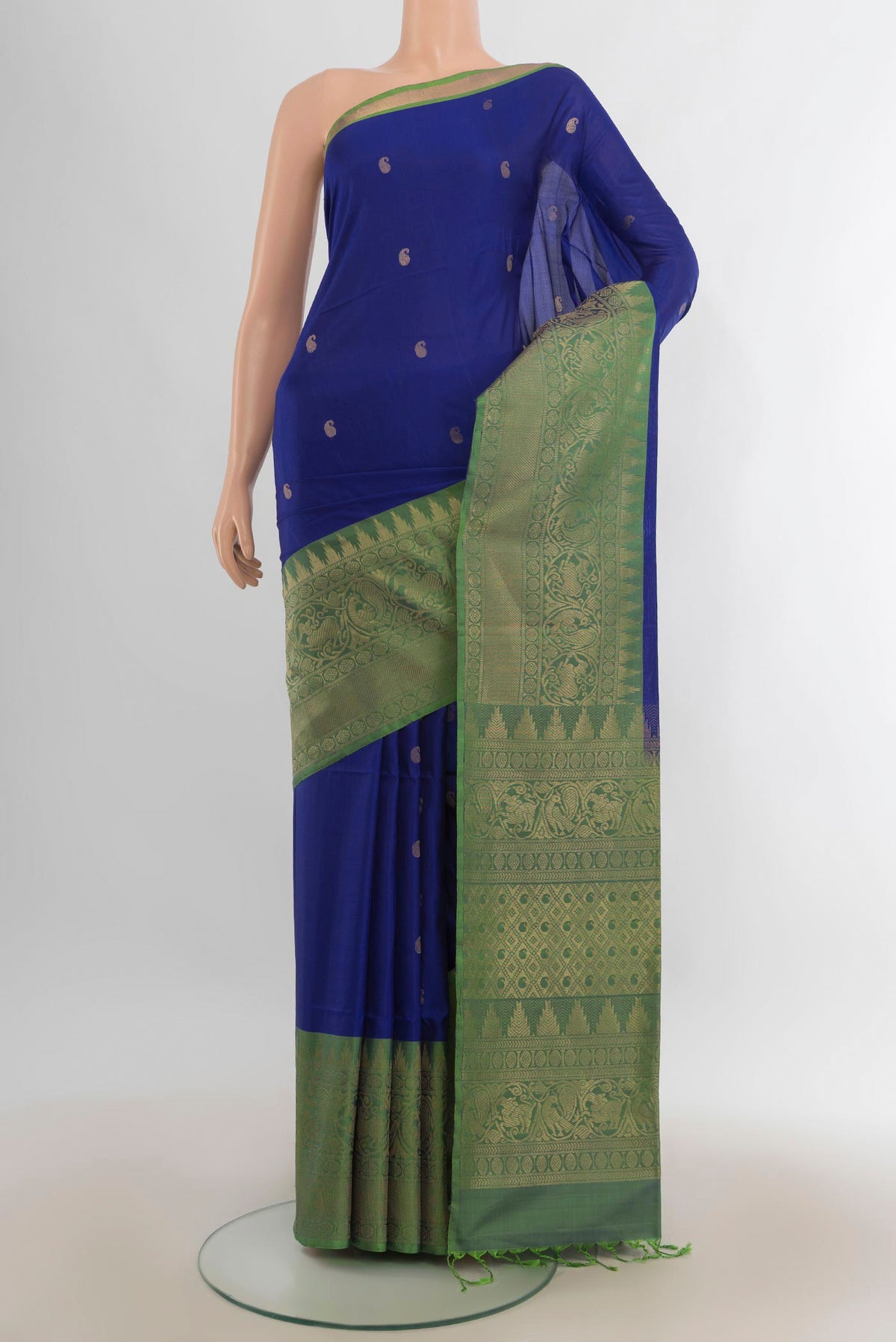 Pure Silk Royal Blue Soft Saree with Zari Butta on the body and Fancy Border.  displayed on a mannequin