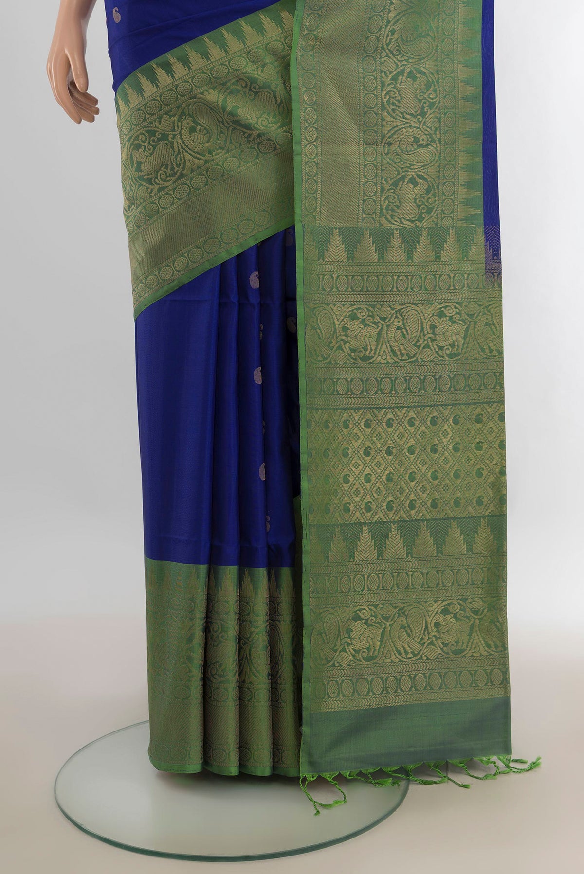 Pleats and pallu of Pure Silk Royal Blue Soft Saree with Zari Butta on the body and Fancy Border. 