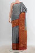 Pure Silk Davys Grey Soft Saree with Zari Butta on the body and Fancy Border.  displayed on a mannequin