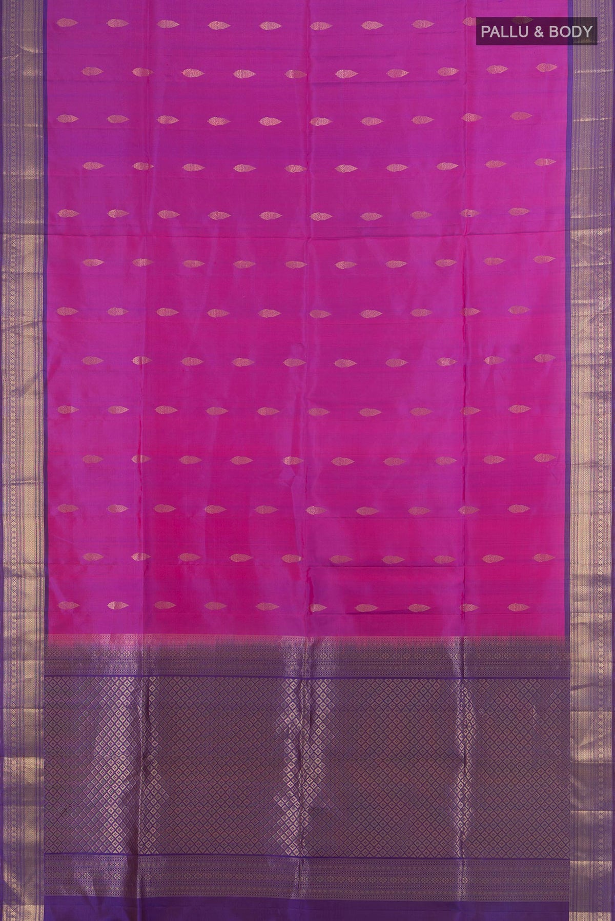 Flat view of Pure Silk Purple Soft Saree with Zari Butta on the body and Silk Border. 