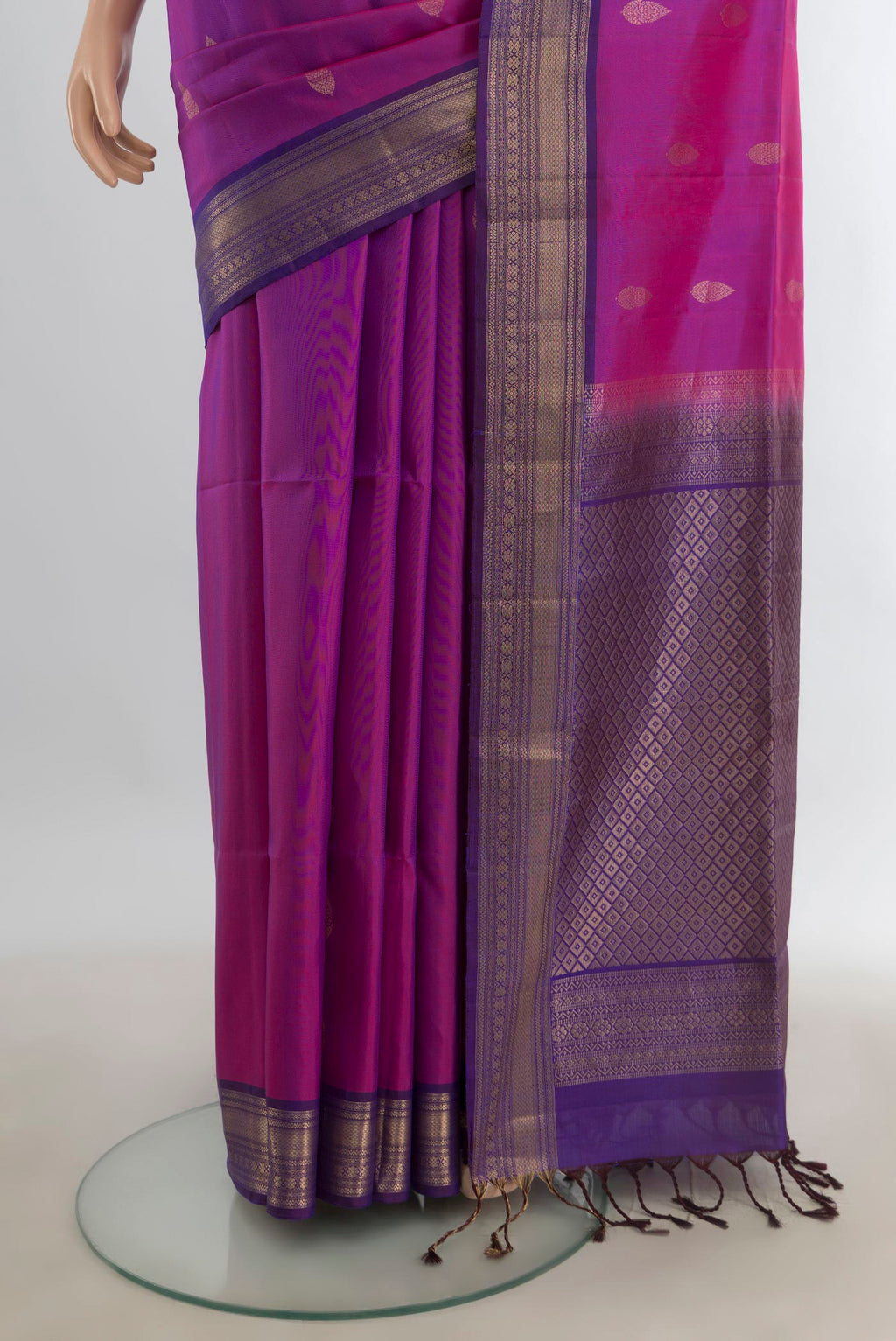 Pleats and pallu of Pure Silk Purple Soft Saree with Zari Butta on the body and Silk Border. 