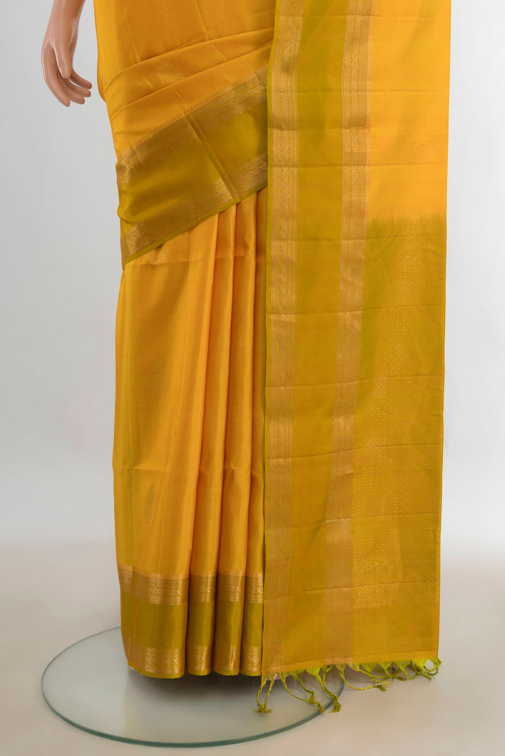 Pleats and pallu of Pure Silk Light Green Soft Saree with Ikat Print on the body and Silk Border. 