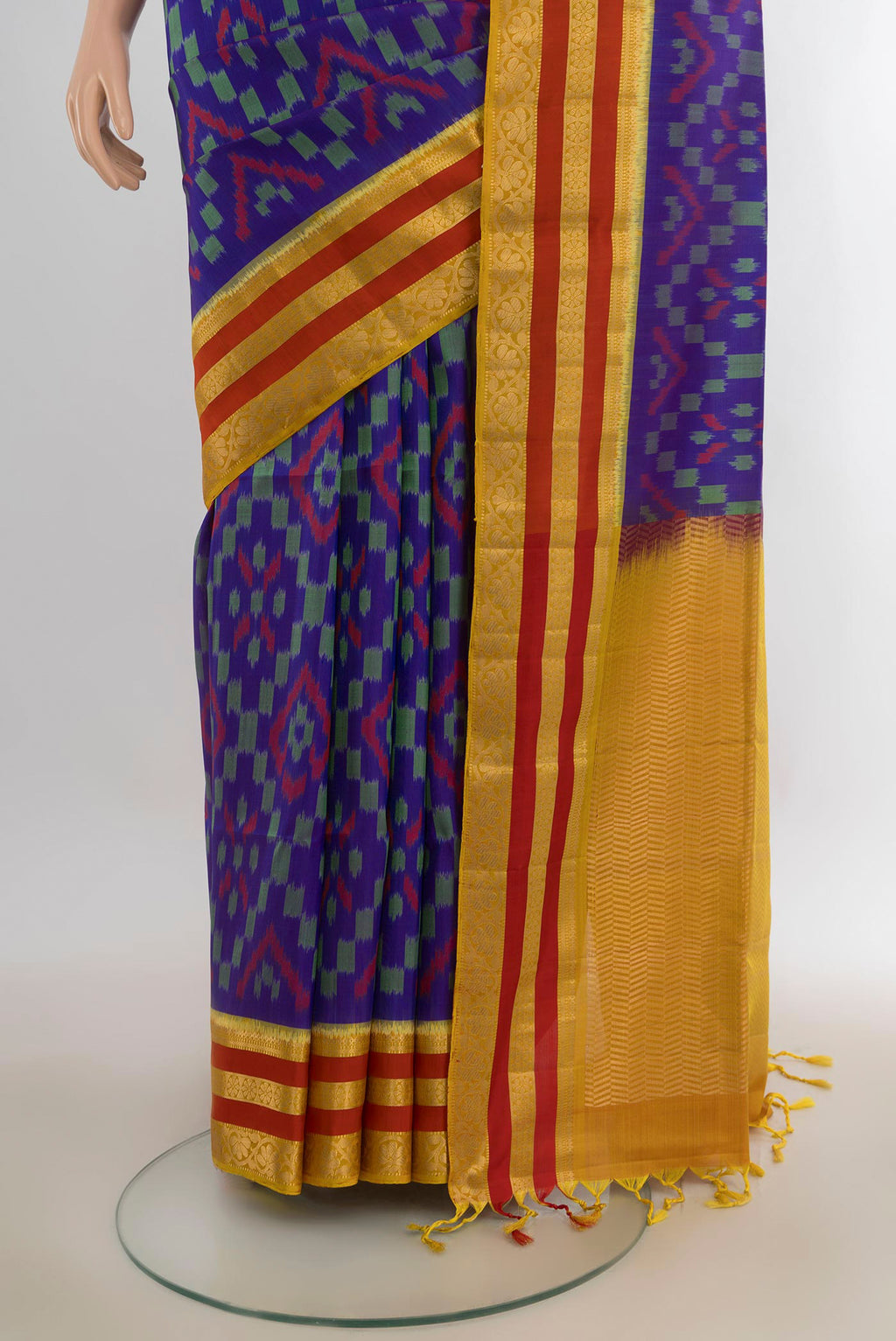 Pleats and pallu of Pure Silk Blue Soft Saree with Ikat Print on the body and Zari Border. 