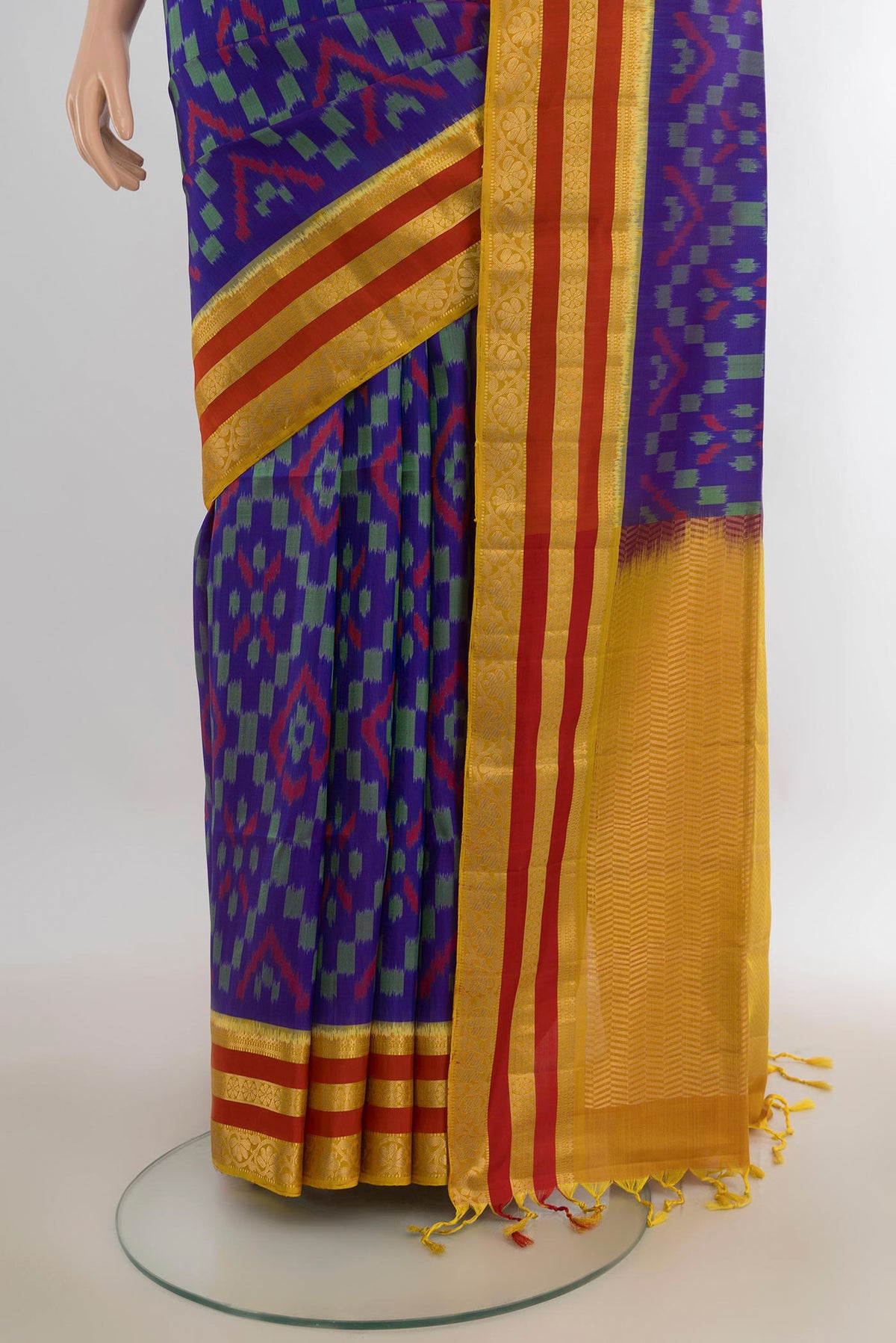 Pleats and pallu of Pure Silk Blue Soft Saree with Ikat Print on the body and Zari Border. 