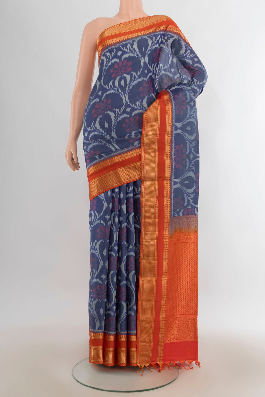 Pure Silk Grey Soft Saree with Ikat Print on the body and Zari Border.  displayed on a mannequin