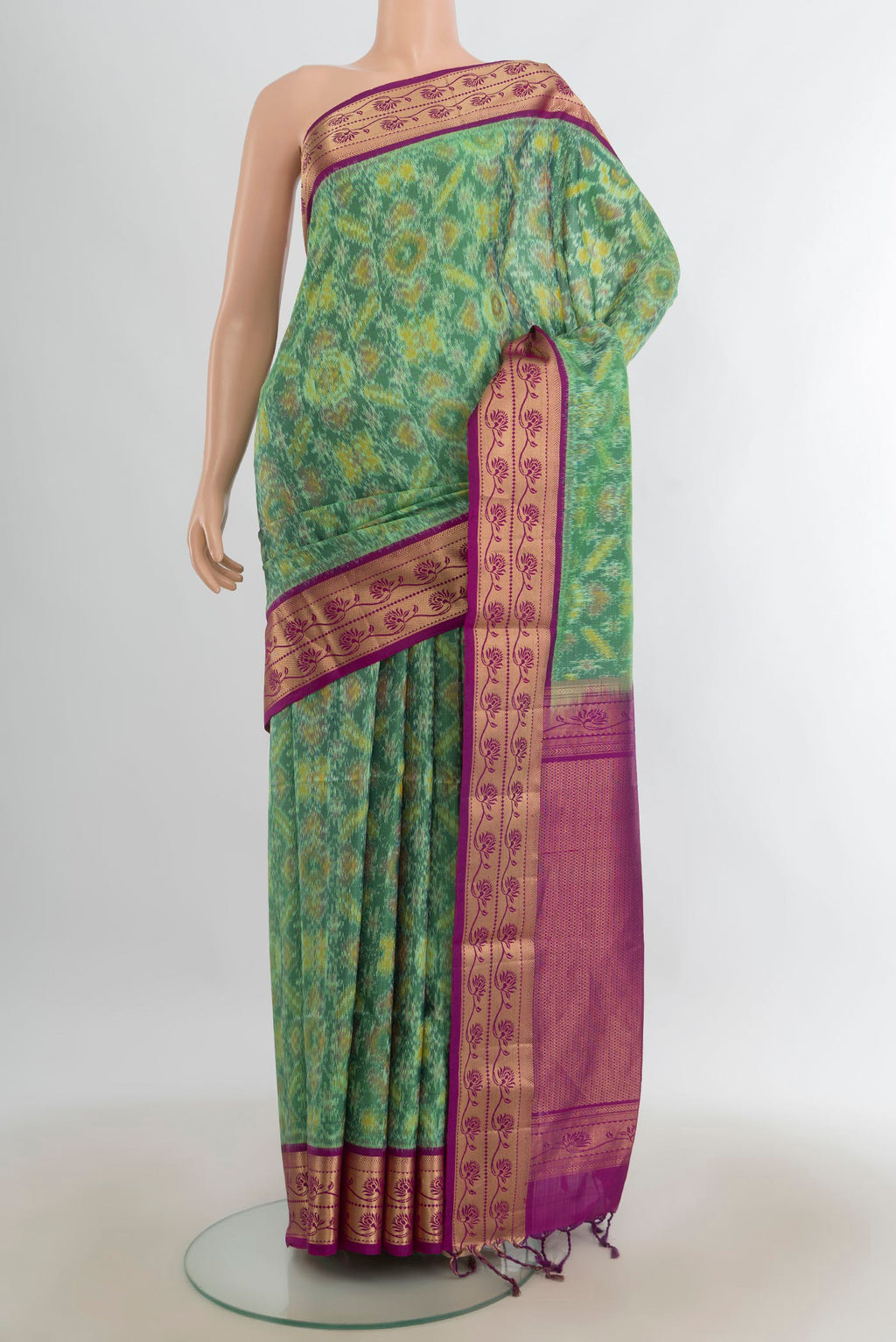 Pure Silk Multi Color Soft Saree with Ikat Print on the body and Silk Border.  displayed on a mannequin