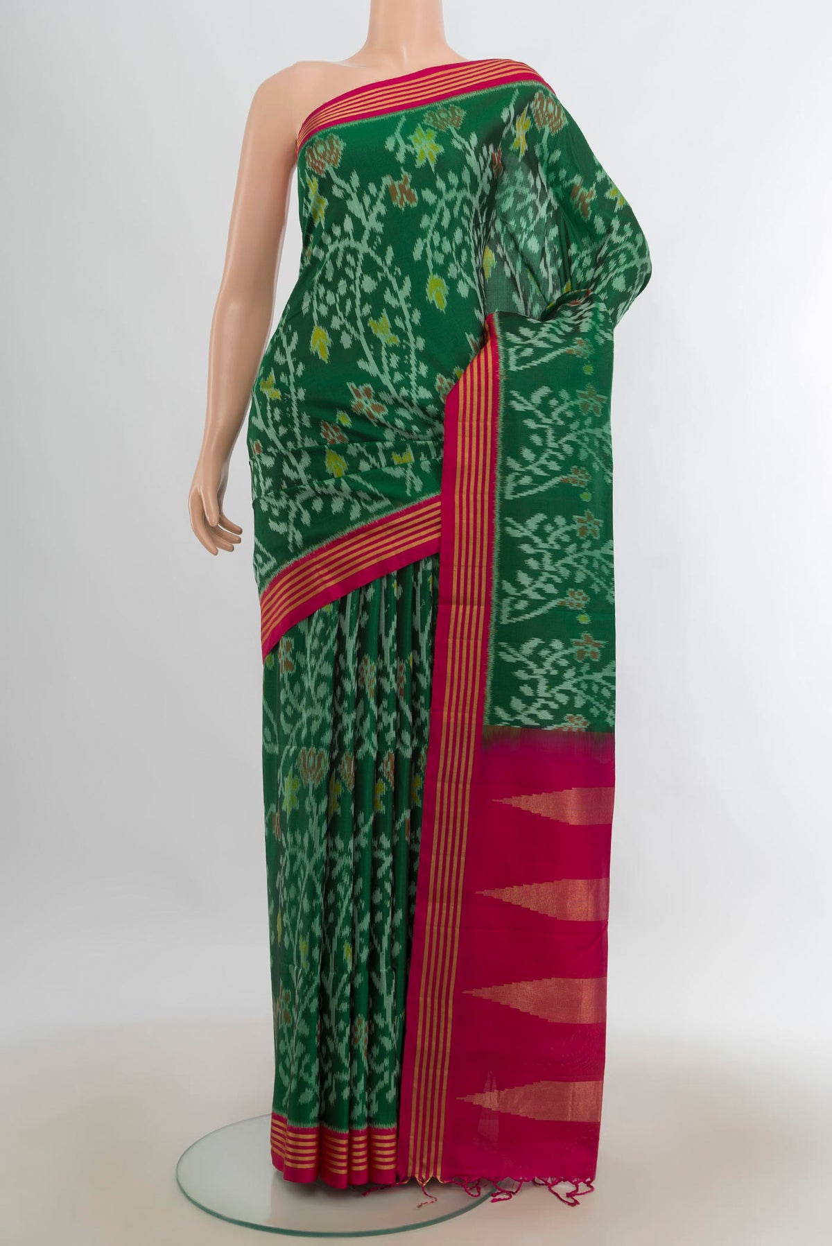 Pure Silk Multi Color Soft Saree with Ikat Print on the body and Silk Border.  displayed on a mannequin