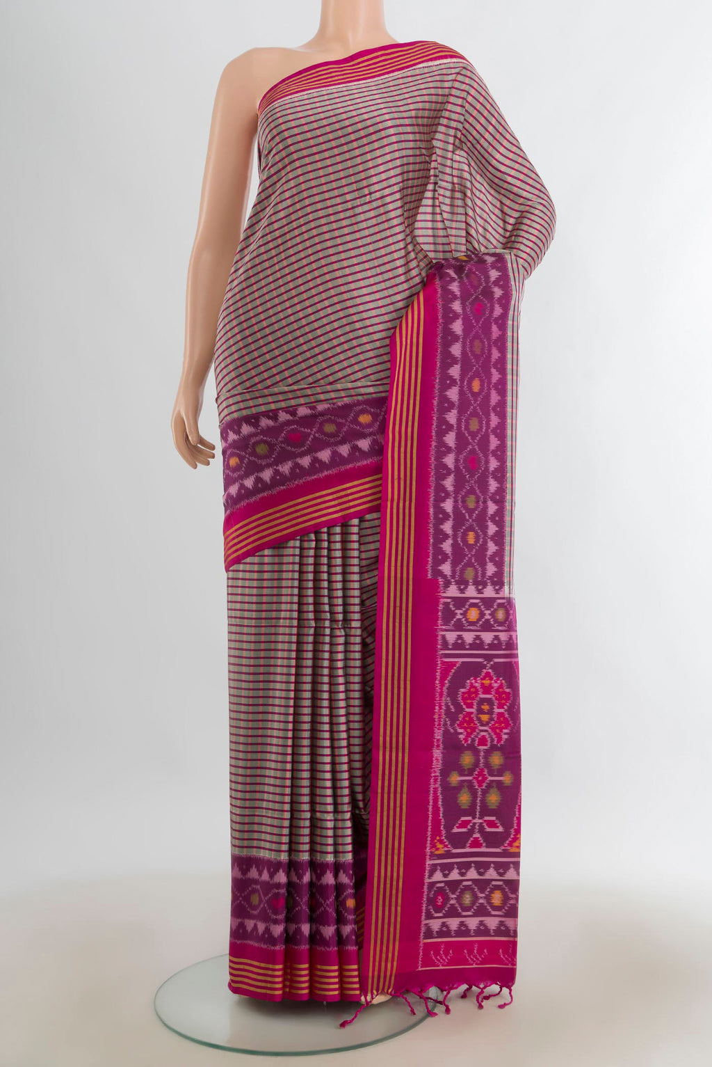 Pure Silk Multi Color Soft Saree with Ikat Print on the body and Silk Border.  displayed on a mannequin
