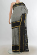 Pure Silk Multi Color Pochampally Saree with Ikat Print on the body and Silk Border.  displayed on a mannequin