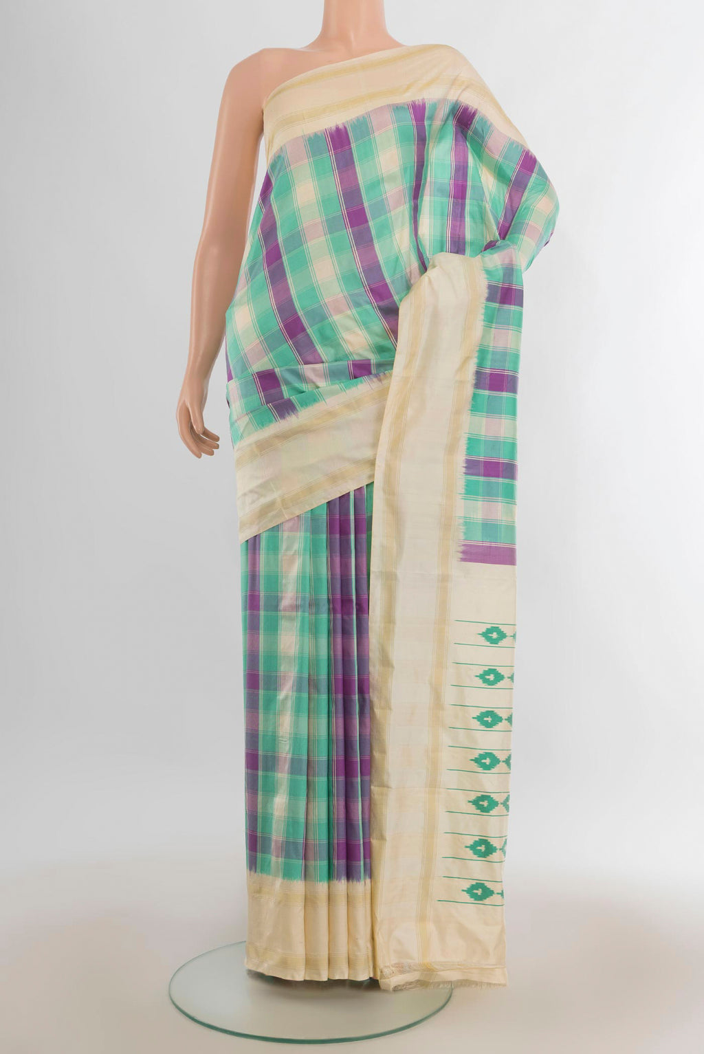 Pure Silk Multi Color Pochampally Saree with Pure Ikat on the body and Plain Border.  displayed on a mannequin