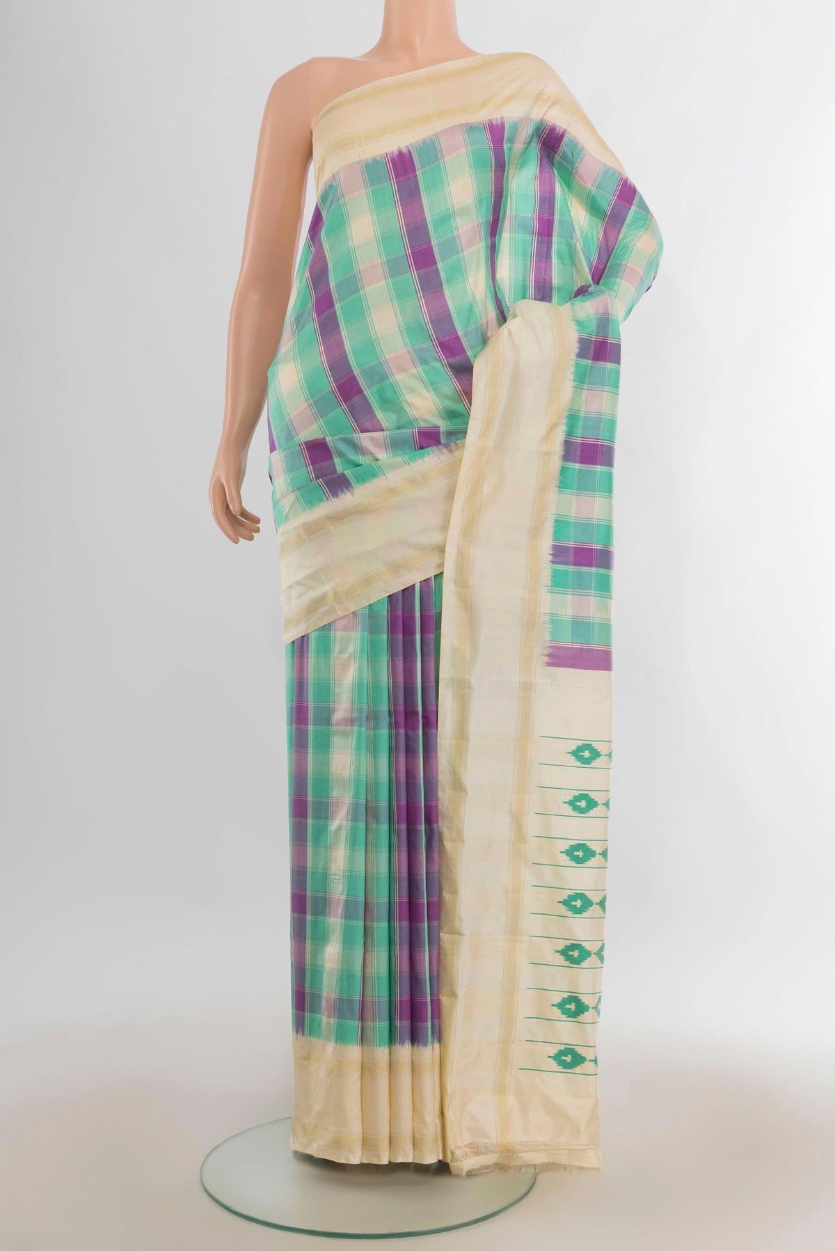 Pure Silk Multi Color Pochampally Saree with Pure Ikat on the body and Plain Border.  displayed on a mannequin