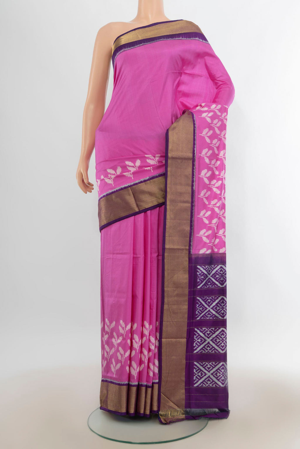 Pure Silk Rose pink Pochampally Saree with Pure Ikat on the body and Zari Border.  displayed on a mannequin