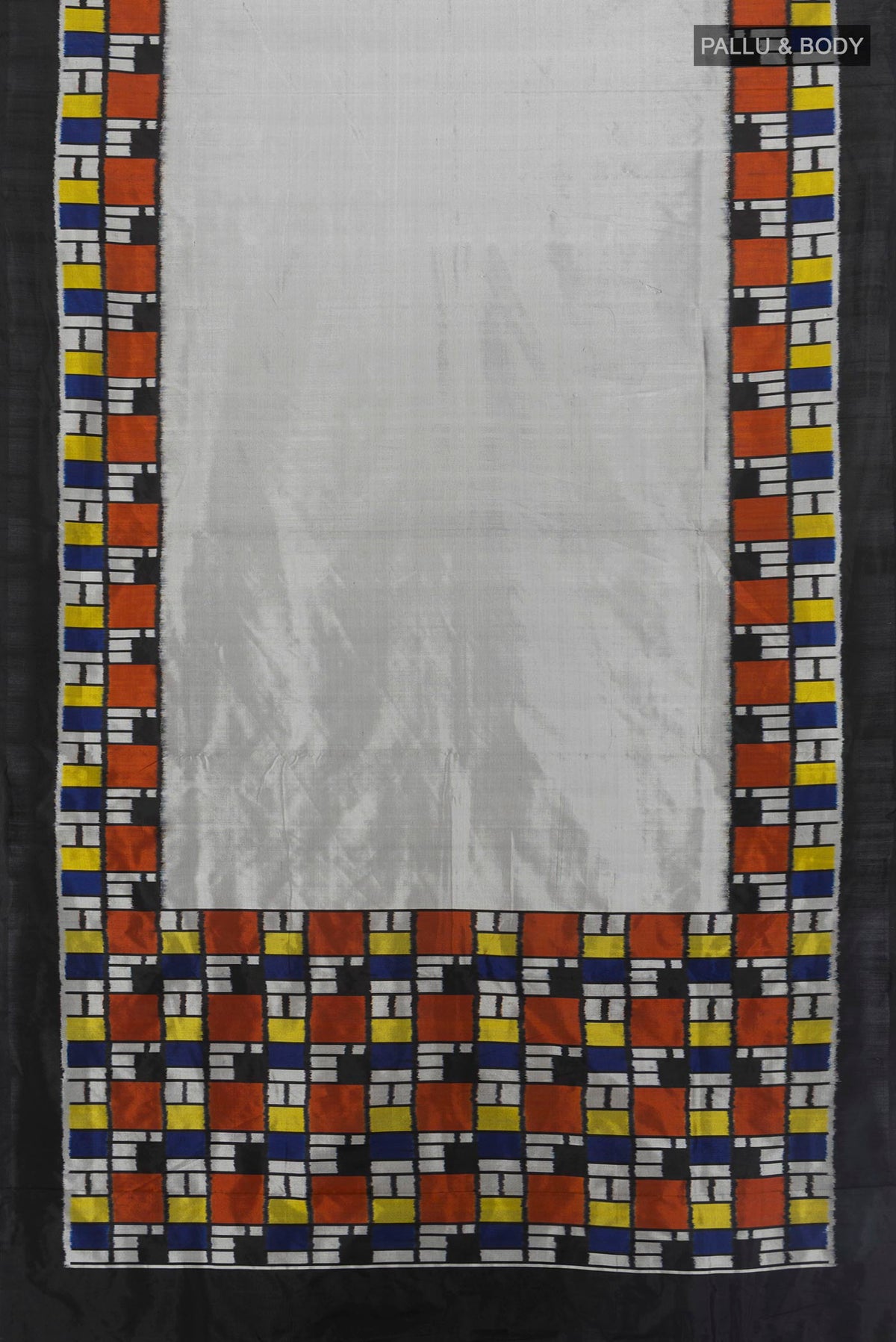 Flat view of Pure Silk Grey Pochampally Saree with Plain Body and Ikat Border. 