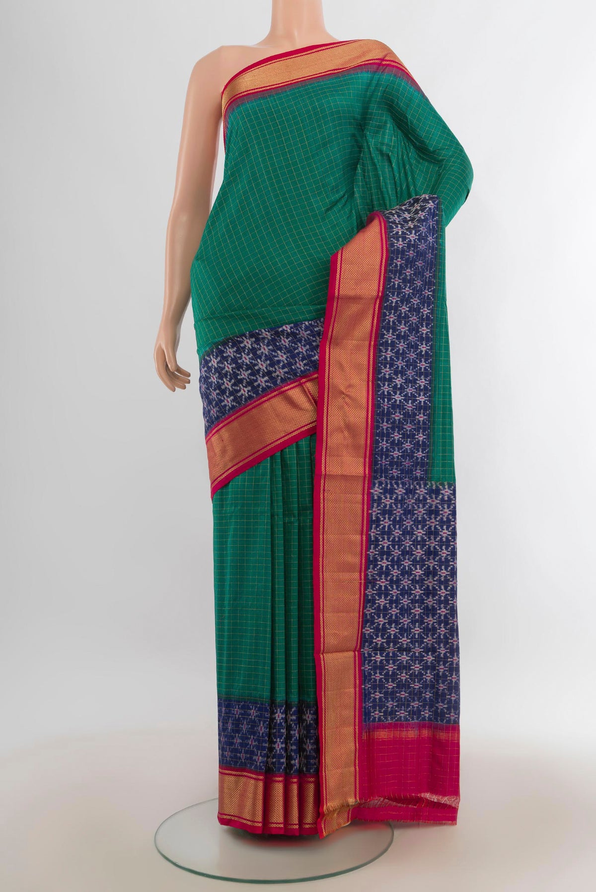 Pure Silk Sea Green Pochampally Saree with Checked design on the body and Zari Border.  displayed on a mannequin